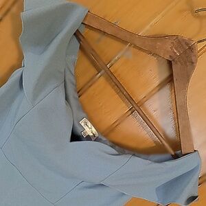 Woman’s light blue off-the-shoulder mermaid midi dress